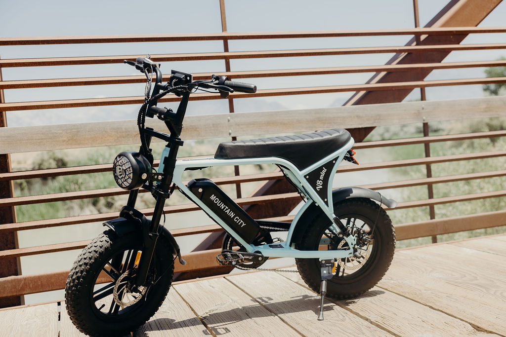 Electric bicycle, featuring a sleek frame, battery pack, and pedal-assist motor.
