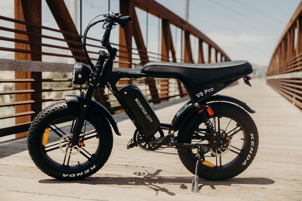 Electric bicycle, featuring a sleek frame, battery pack, and pedal-assist motor.